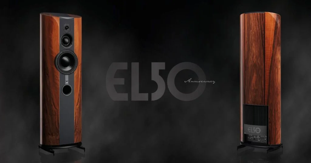 ATC EL50 Anniversary floorstanders in walnut against a smoky dark backdrop