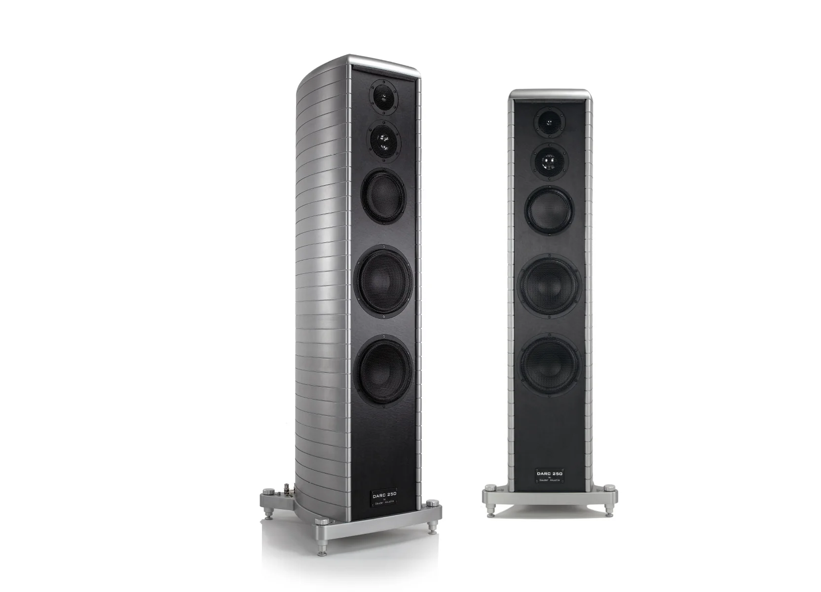 A pair of Gauder Akustik floorstanders in wood and ribbed aluminum on their plinths