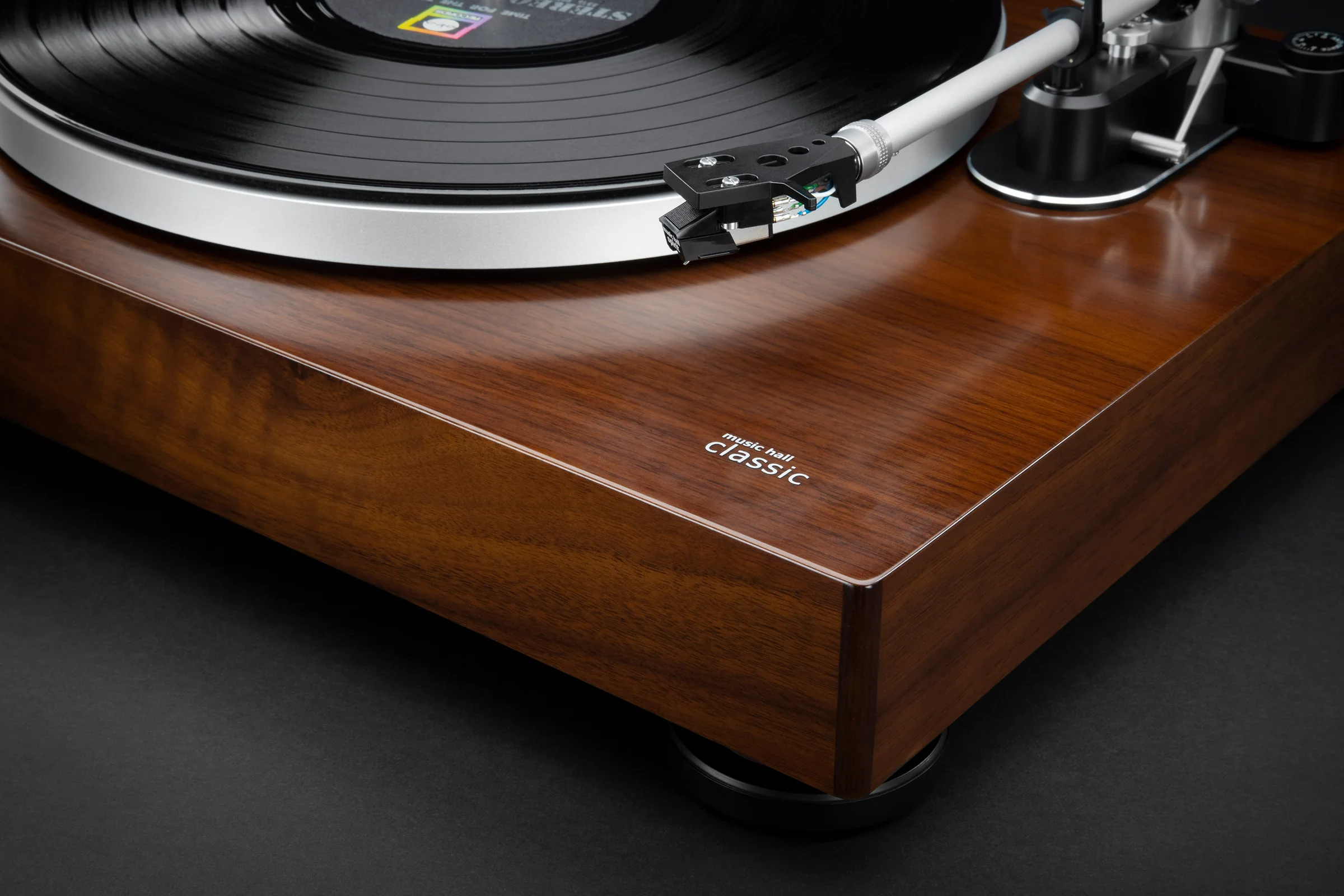A Music Hall Classic turntable in walnut, tonearm at rest