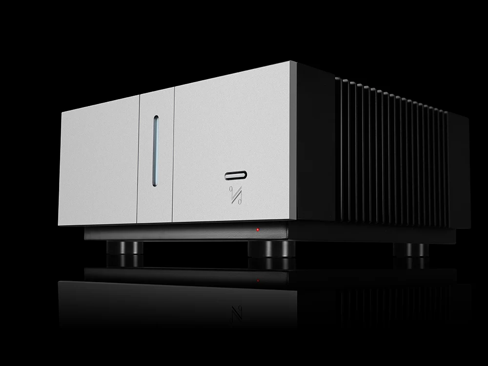 A Quad power amplifier in black, a single silver blade across the fascia