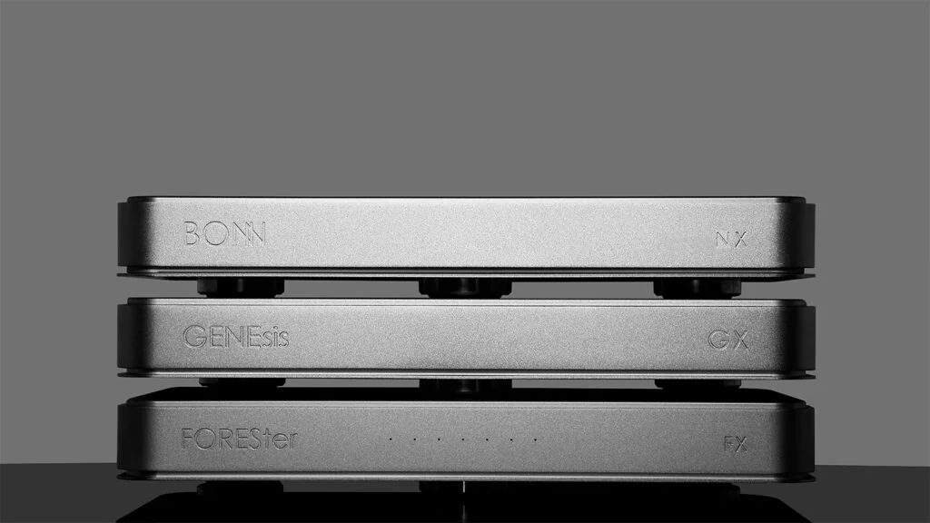 Three Silent Angel network components stacked on grey